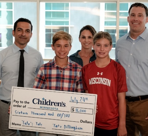 youngfundraisers present check to doctors at Children's Minnesota hospital
